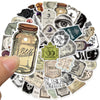 A circular arrangement of vintage Halloween potion bottle labels and retro horror stickers.