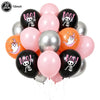 A bunch of 20 balloons featuring black and pink ghost designs for a Halloween party