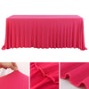 A bright pink stretch rectangle tablecloth draped over a table, showing its smooth texture and folds.