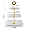 A three-tier gold-colored plastic dessert stand with white scalloped plates.
