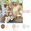 A brown and white balloon garland kit featuring various sized balloons and a gold-colored chair in an outdoor setting.