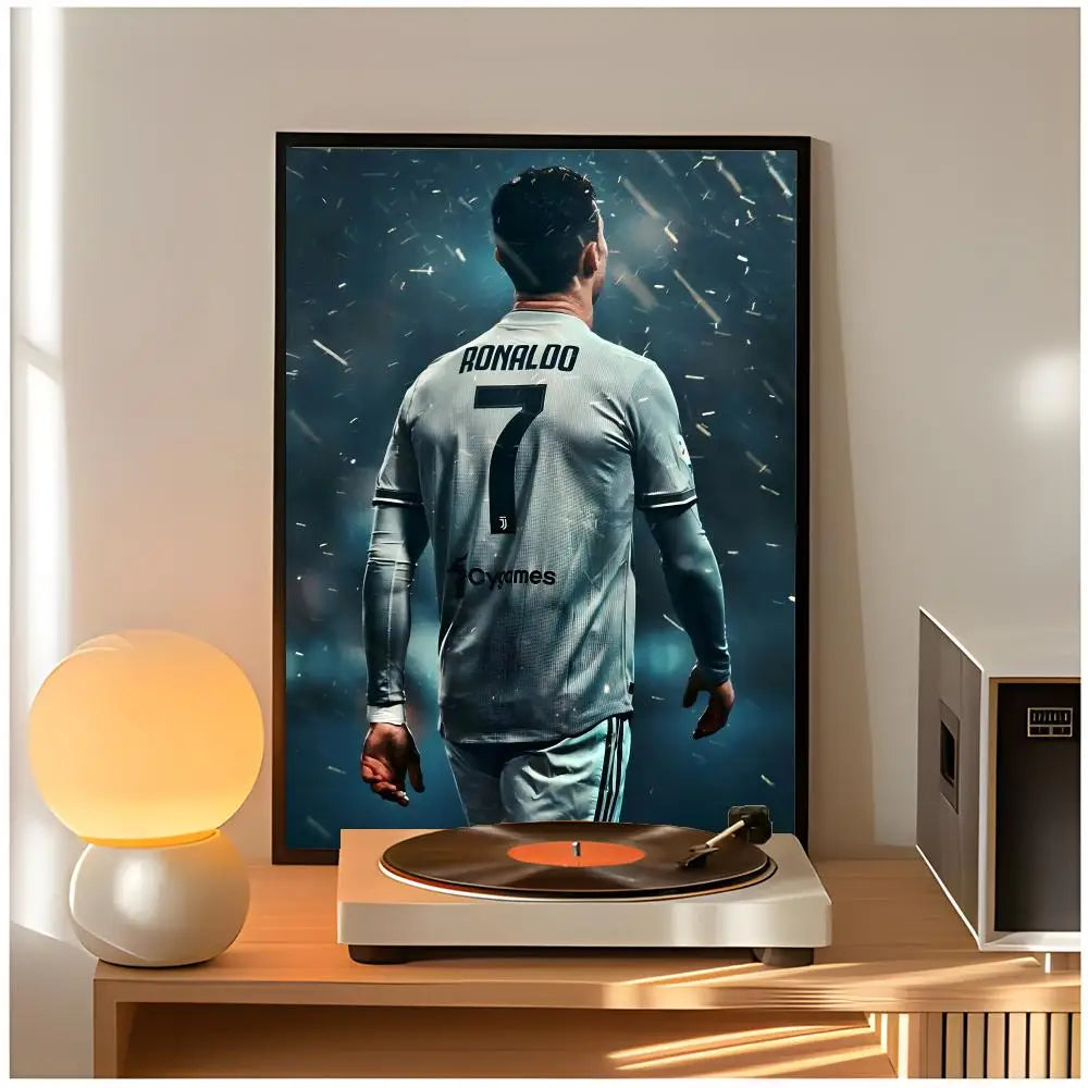 A poster of Cristiano Ronaldo in a gray jersey is displayed on a wooden table.