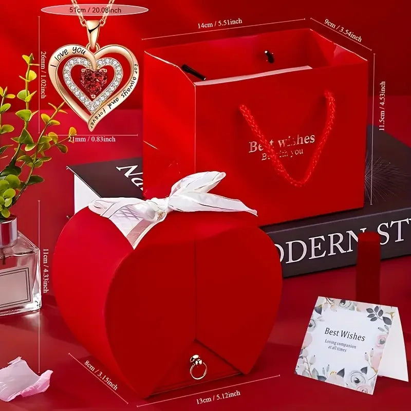 A red velvet box containing an elegant rose pendant necklace and a heart-shaped gift box.