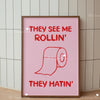 Pink canvas wall art print with text saying They see me rollin' and They hatin' featuring a rolled-up scroll graphic