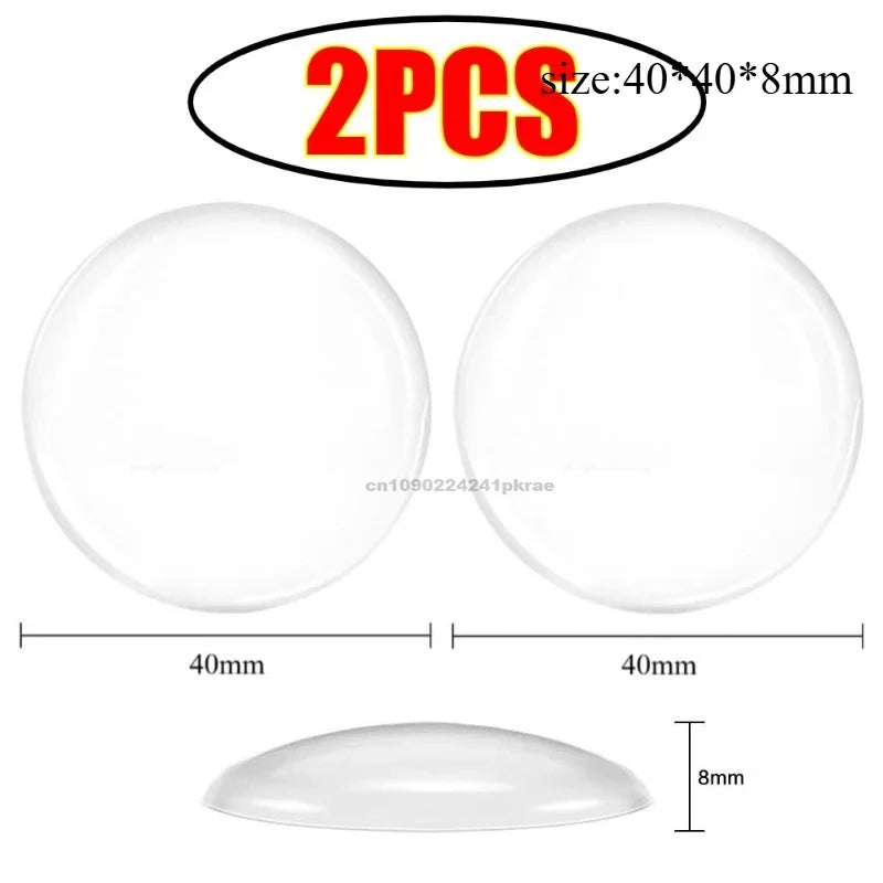 Two white silicone door stoppers or bumpers shown with dimensions of 40mm diameter and 8mm thickness.
