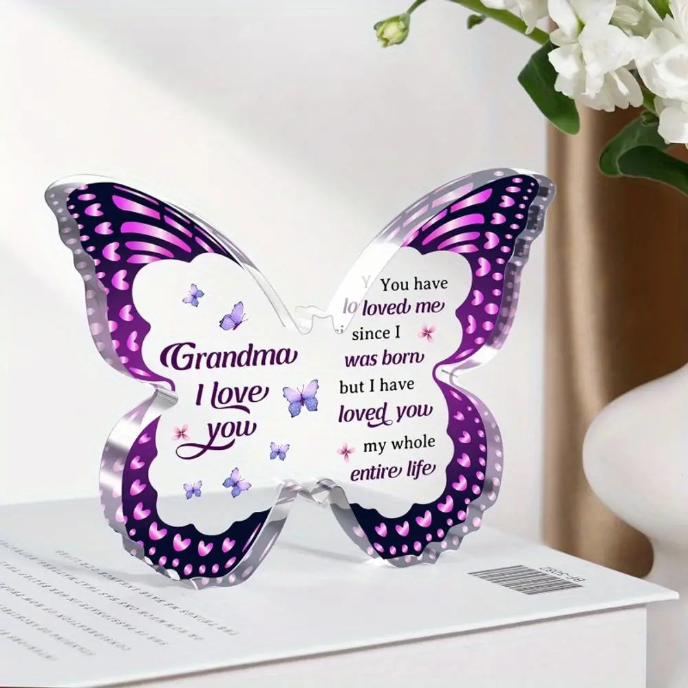 A purple and silver acrylic butterfly keepsake with a message inside, designed as a personalized gift.