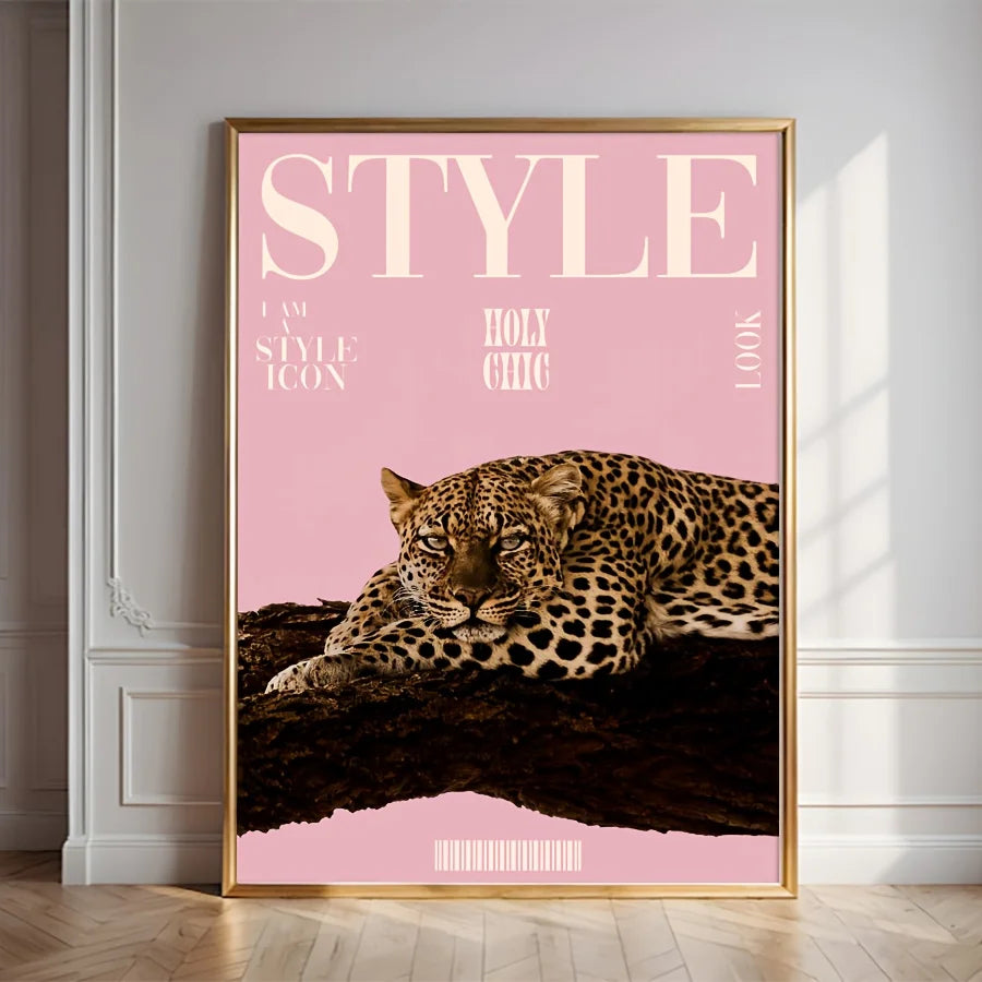 Pink framed canvas wall art featuring a realistic leopard resting on dark fur.