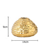 Golden wrinkle ceramic tabletop vase with a textured, organic shape.