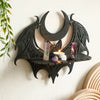 Black gothic bat moon floating wall decor with amethyst crystals and a candle