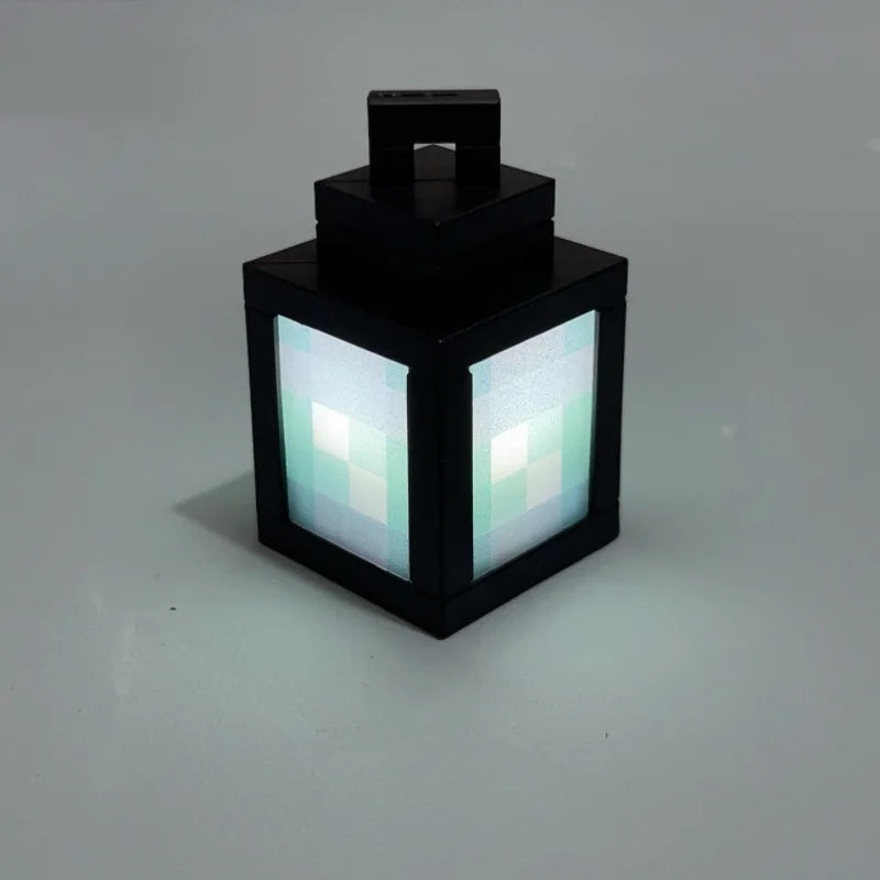 A black pixel style RGB night light lantern with a square base and a rectangular glowing panel.