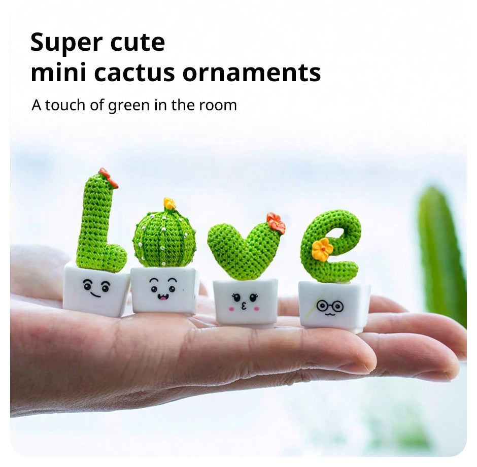 A hand holds four small resin succulent cacti ornaments in various green shades for home decor.