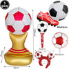 A set of inflatable soccer balls and a gold stand for party decoration.