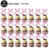 A set of 20 pink bow cupcake toppers measuring 4x11cm.
