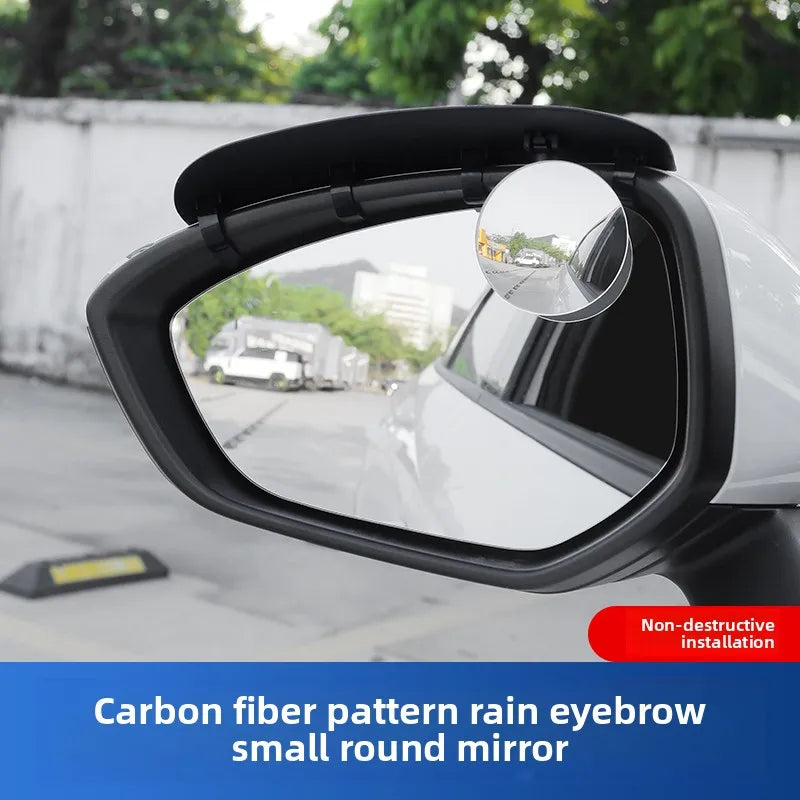 Carbon fiber rain eyebrow small round mirror installed on a vehicle's side view.