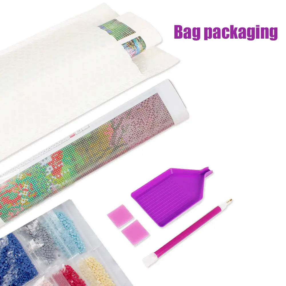 Bag packaging for a Seaside Diamond Painting Kit showing various colored beads and a white sheet.