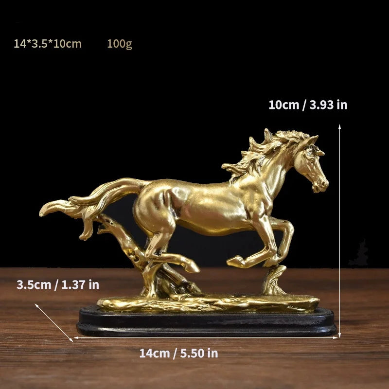 A gold-colored sculpture of a horse and fence on a dark wooden base.