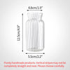 A tall, cylindrical clear glass vase with vertical ridges and a slightly flared rim.