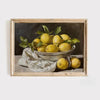 Oil painting of yellow lemons in a bowl with green leaves on a dark background