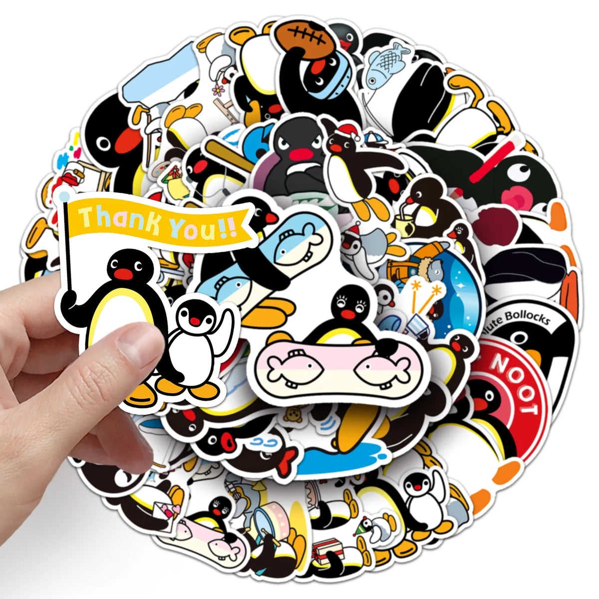 A hand holds a circular pack of 50 cute penguin stickers for DIY crafting