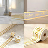 Gold and white self-adhesive PVC skirting board trim featuring a Greek key pattern for wall baseboards.