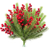 A festive bouquet of frosted pine needles and bright red berries for Christmas decoration.