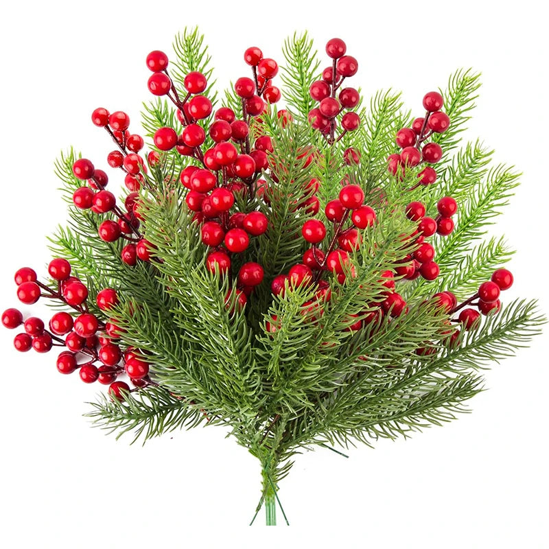 A festive bouquet of frosted pine needles and bright red berries for Christmas decoration.