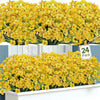 A bouquet of bright yellow silk artificial flowers displayed on a white shelf.
