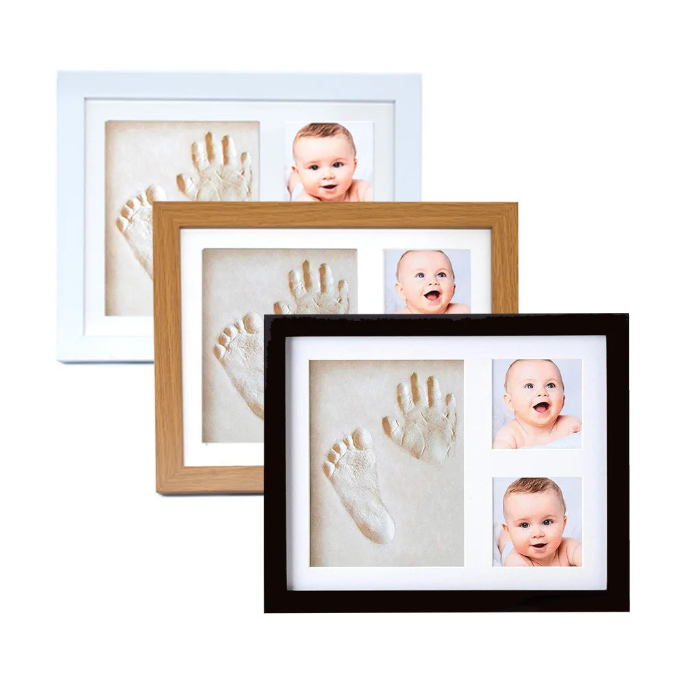 A set of three framed photos showing baby handprints and footprints.