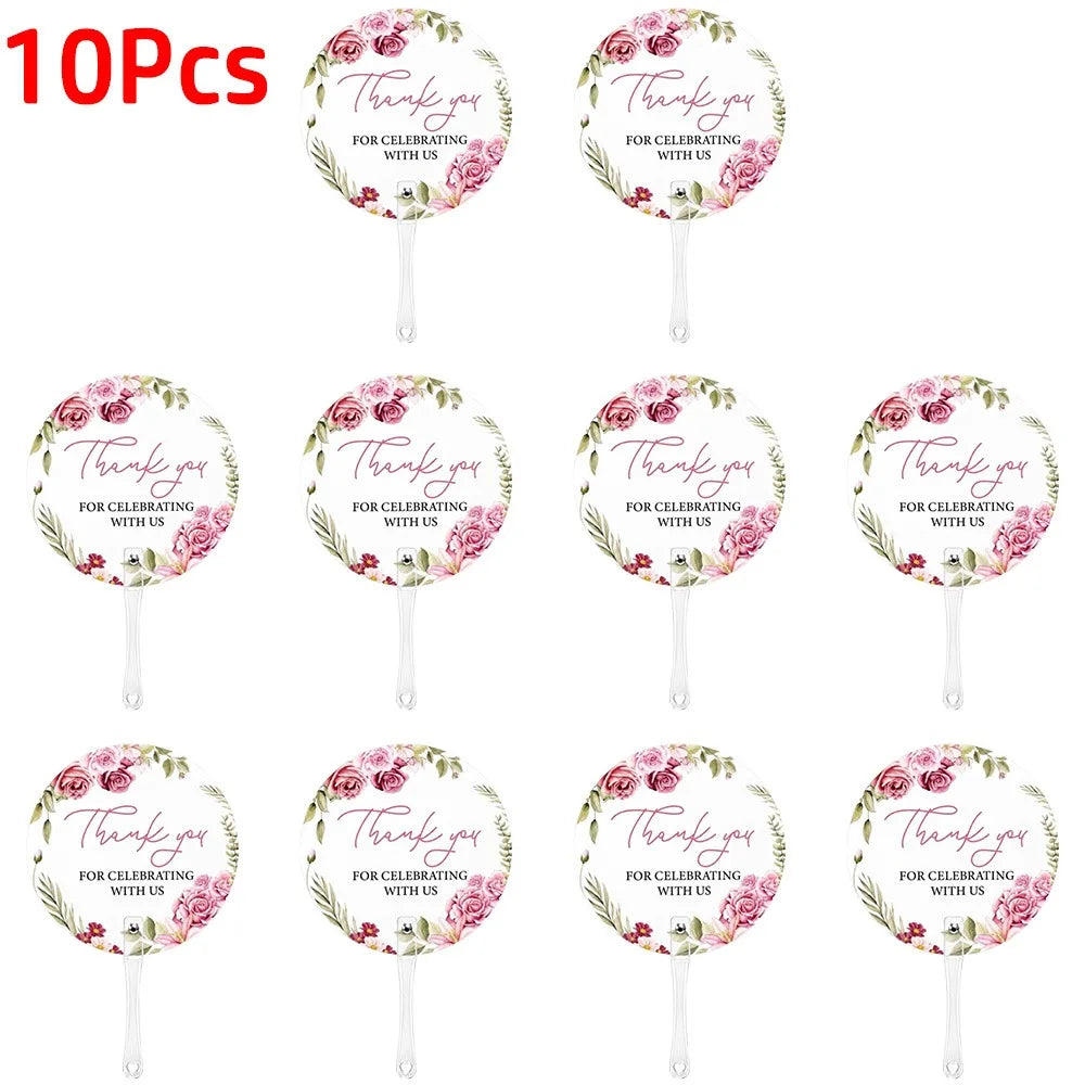 A pack of ten pink floral thank you hand fans with delicate petals.