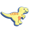 A yellow cartoon dinosaur PVC shoe charm with orange stripes and a light blue border.