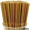 A close-up view of a pack of golden biodegradable paper drinking straws.
