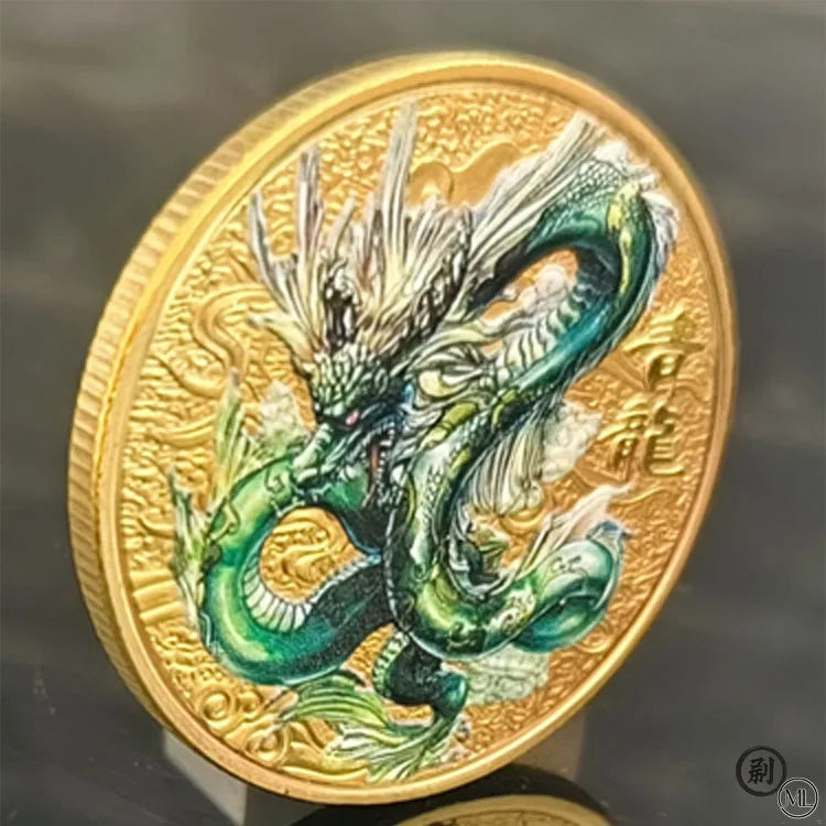 A gold-colored collectible coin featuring a detailed depiction of a green mythical dragon with a Tai Chi motif.