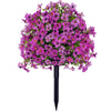 A dense spherical arrangement of vibrant purple and pink artificial eucalyptus violet flowers on a black stem.