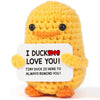 Handmade yellow knitted duck plush toy with an inspirational card that says I duck love you