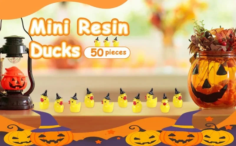A collection of 50 yellow resin ducks with witch hats displayed on a wooden surface.