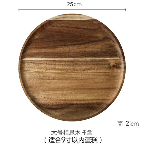A round wooden cake tray with a glass dome cover, measuring 25cm in diameter and 2cm high.