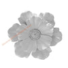 A close-up of a white layered resin floral wall decor flower.
