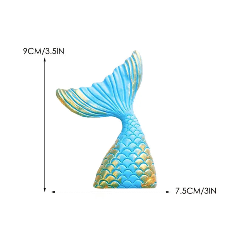 Blue mermaid tail cake topper featuring a seashell and sea star design.