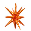 A golden star burst foil balloon with sharp points, used for party decoration.