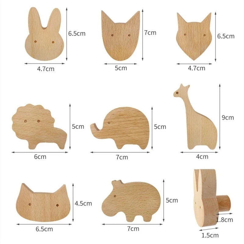 A collection of decorative wooden animal hooks, including a rabbit, elephant, giraffe, and hedgehog.
