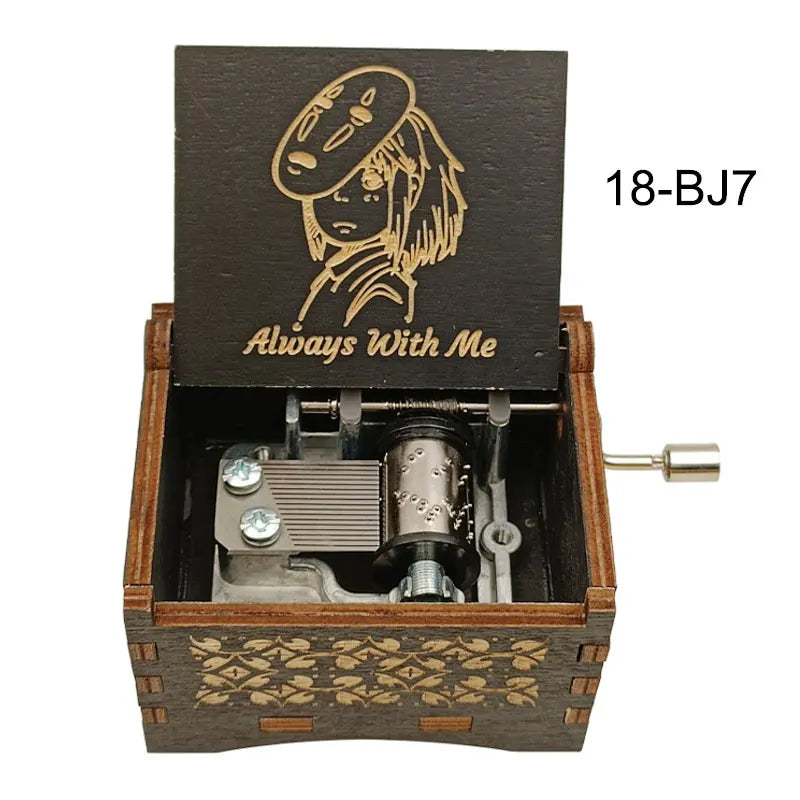 A wooden music box featuring an anime character design and a mechanism.
