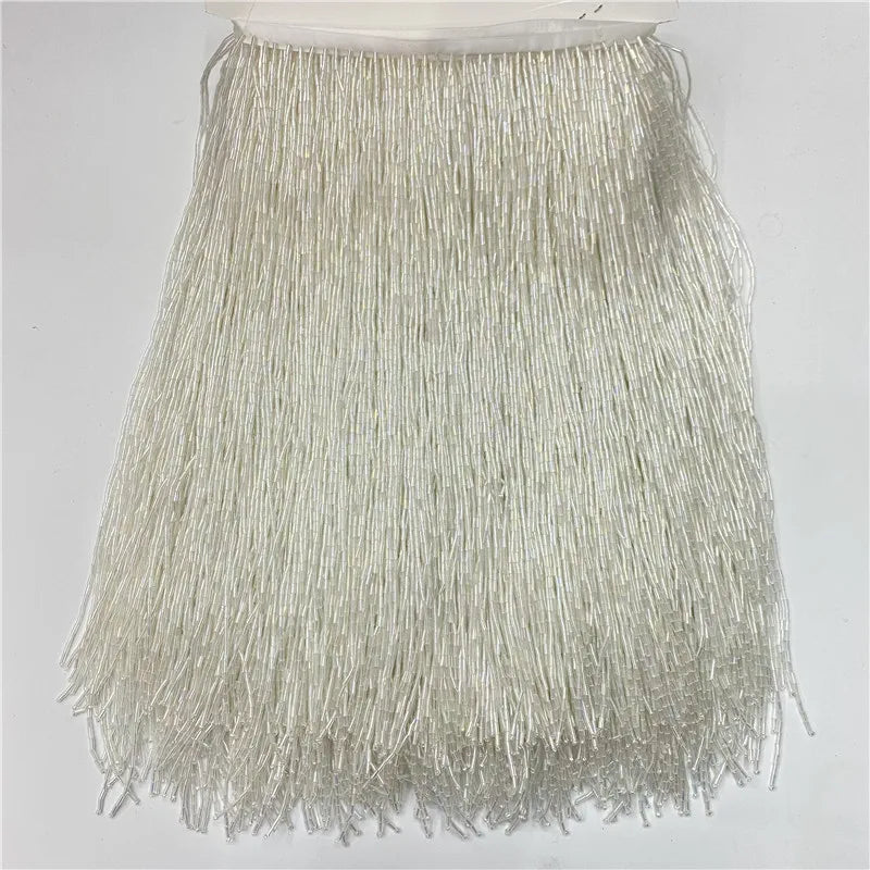 Silver beaded tassel fringe trim used for curtains and DIY projects