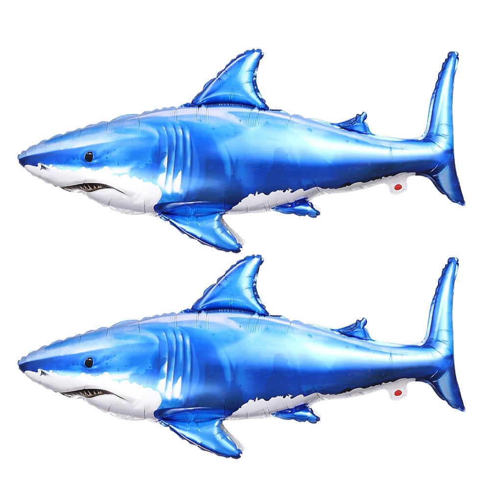 Blue and white shark foil balloons for ocean-themed party decorations