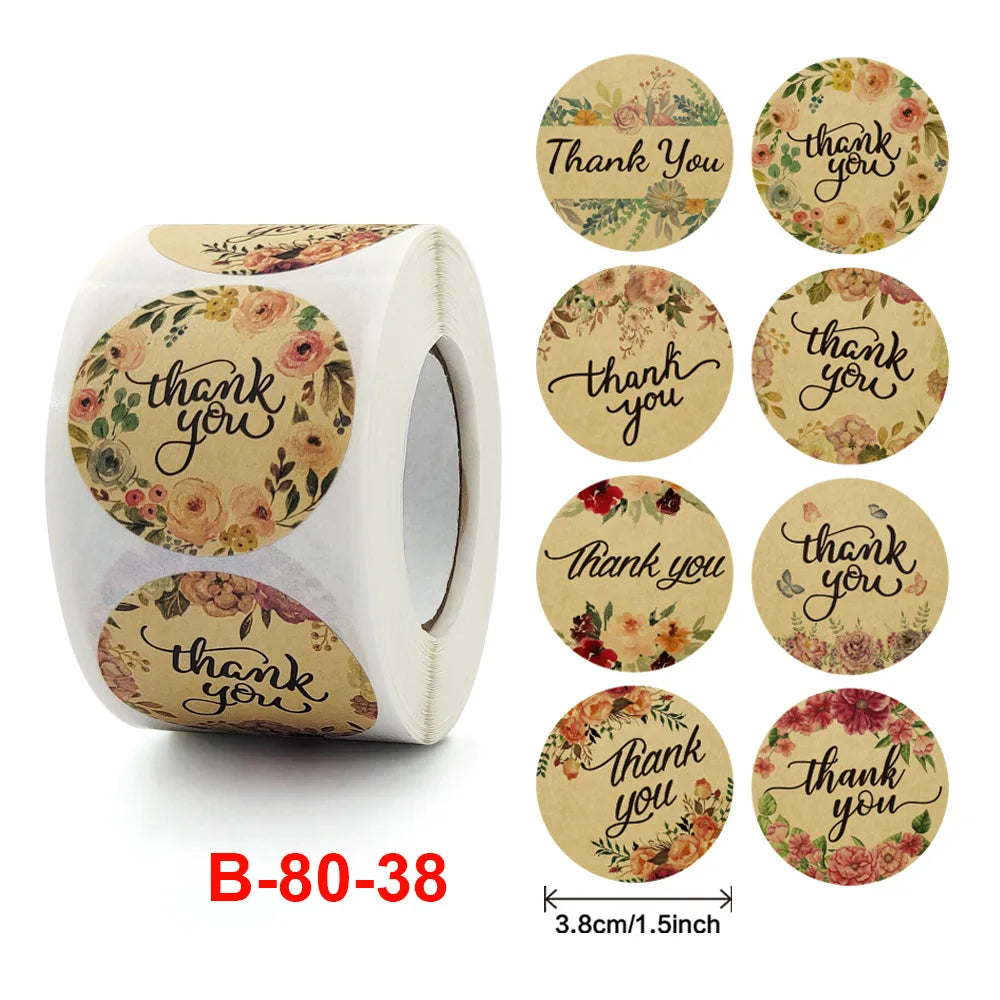 Roll of gold foil thank you sealing stickers in various floral designs for envelopes and gifts