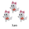 A set of three white ghost foil balloons with pink bows and orange pumpkin details for a Halloween party decoration.