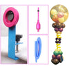 A set of tools for balloon stuffing, including a pink inflator, a blue tool, and a collection of colorful balloons.
