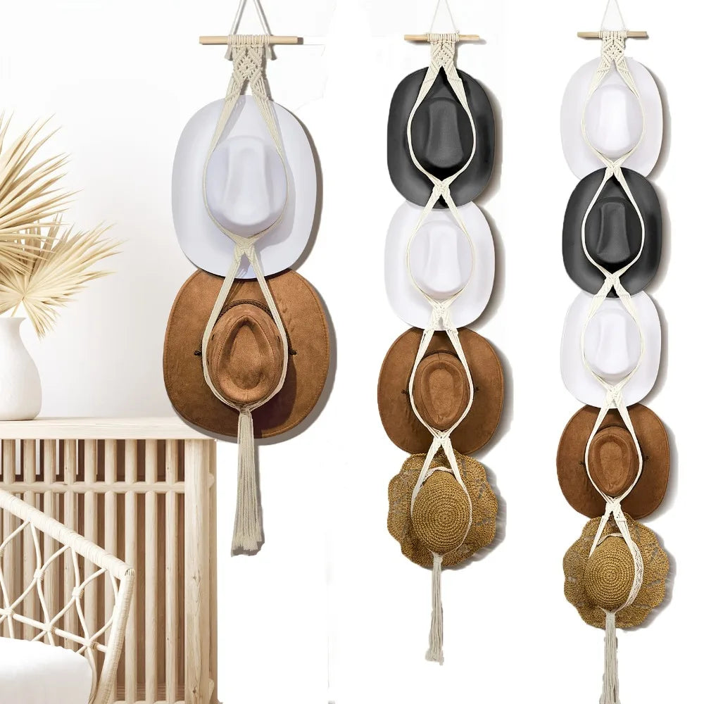 Bohemian macrame hat hanger with round woven hats displayed on a white wall.