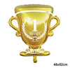 A golden trophy cup with the number 1 and winner ribbon, used as a football-themed party décor item.