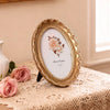 Vintage Resin Photo Frame with Golden Ornamental Details