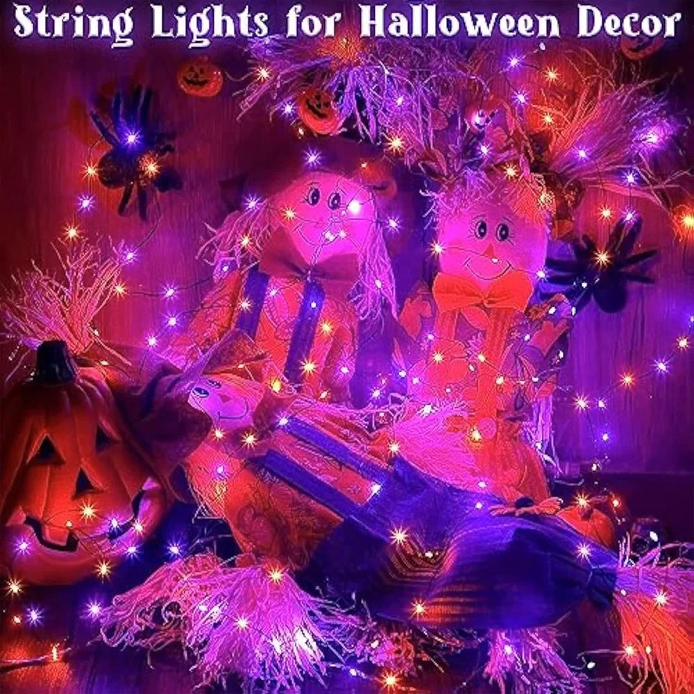 Purple and orange fairy string lights illuminating a Halloween decor scene with pumpkins and spooky foliage.